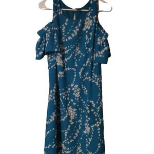 Teal and white lined mid length dress.